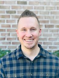 How does Calvin's view of The Lord's Supper differ from Zwingli's view?