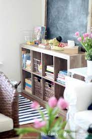How To Set Up A Playroom For Kids When You Don T Have A Lot Of Space Toy Organization Living Room Living Room Toy Storage Toy Rooms