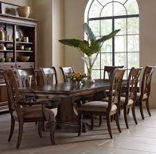 Set of 3,5,6,7, 9 items including 1 table, parson chairs and/or bench. Kincaid Furniture Portolone Nine Piece Trestle Table And Harp Back Chairs Set Wayside Furniture Dining 7 Or More Piece Sets