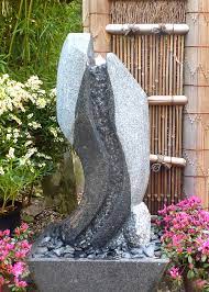 Natursteine für haus und garten. Quellsteine Und Gartenbrunnen Aus Granit Bambus Kultur