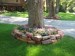 Cut tree branches in thick slices, paint cute figures at their core and mount them onto the wall in. 15 Beautiful Ideas For Decorating The Landscape Around The Trees Landscaping Around Trees Backyard Landscaping Landscaping Trees