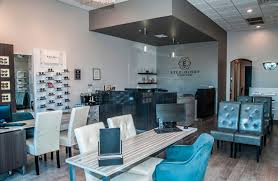 From plants to tunnels, here are the floor plans of 10 workplaces that are divided in unusual ways. Optical Displays Space Design Furniture Eye Designs Group