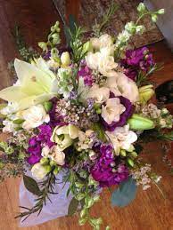 Bridal Bouquet With Lilies Lisianthus Freesia Stock Wax Flower And Rosemary By Pauline S Bloomers Visit Us On Facebook City Flowers Wax Flowers Flowers