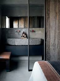 The bathtub of volcanic limestone and resin is by victoria + albert, and a ladder shelf keeps towels at a hand's reach. 380 The Most Cool Bathroom Designs Of 2014 Digsdigs