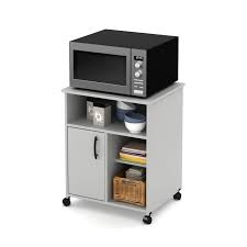 There is plenty of storage room with 1 spacious drawer, 1 open space, and 1 adjustable shelf sperarated by 2 doors. South Shore Smart Basics Microwave Cart With Storage On Wheels Walmart Canada