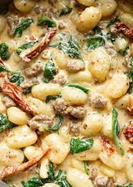 Pillowy Gnocchi In A Creamy Garlic Sun Dried Tomato And Spinach Sauce Makes The Most Amazing Comfort F Comfort Food Recipes Dinners Recipes Best Comfort Food
