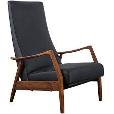 this mid century modern high back lounge chair was designed by milo baughman it features a walnut mid century modern sofa vintage mid century furniture chair