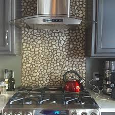 Pebble tiles can help you create a uniquely attractive backsplash for your kitchen or bathroom. Pebble Tile Wall Coverings Pebble Tile Shop