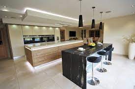 This Large Kitchen Incorporates A Vast Amount Of Lighting From Led Strip Lighting White Coloured To Spotlights And Kitchen Design Kitchen Kitchen Lighting