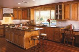 We just purchased a home with cherry cabinets (the stain is cherry spice) and a very dated faux marble, green laminate countertop. Modern Contemporary Kitchen Cabinets Painted White Glaze Beadboard