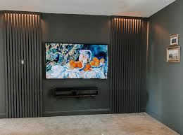 Wall mounting may also make it difficult to access ports at the back of the tv, since most wall mounts are low profile and keep very little gap between the when needed, it can also be used to gain access to ports at the back of the tv. Moody Tv Room And Diy Led Slat Wall Tutorial