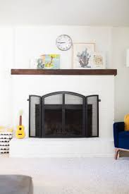 But with some fresh paint and a new mantel, now it's the centerpiece of our family room. How To Paint A Brick Fireplace Diy From Lovely Indeed