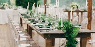 Modern dining room table with simple but stylish wooden chairs, a vase of flowers and an elegant table setting. 20 Summer Tablescape Ideas For An Outdoor Party Elegant Summer Table Decor
