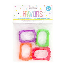 But did you check ebay? Neon Plastic Vampire Fangs Halloween Party Favors