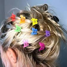 Hair accessories are to the '90s what hairspray was to the '80s—and plastic butterfly clips were the most sacred of all. Butterfly Clips Butterfly Hair Clip Hair Accessories Clip Hairstyles