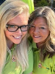🌧️⛱️ Just another day in paradise! Scooping poop as the storm clouds roll  in—because rain or shine, 💩 still happens! I'm Kara (on the left 👋) and  this is my amazing momma