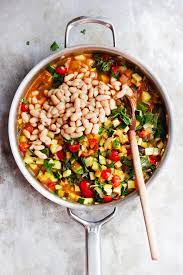 Zucchini Stew With Tomato Sauce And White Beans Recipe Vegetable Stew Stew Recipes Ratatouille Recipe