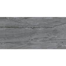 Marble effect tiles are the perfect choice for creating spaces with a fundamentally minimalist yet dynamic and energetic character. Comet Dark Grey Marble Effect Gloss Wall And Floor Tile 300mm X 600mm Victoriaplum Com