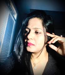 winter loneliness ... a blurred moon between the clouds