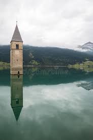 When anna mysteriously disappears, kids must undertake a journey which will make them discover the. Kirchturm Von Lago Di Resia In Curon Venosta Stockbild Bild Von Reflexion Smaragd 78979127