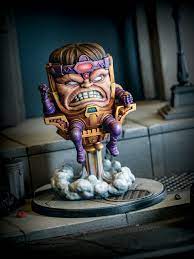 M.o.d.o.k, aka the mental organism designed only for killing, is a classic antagonist that has tangled with half of the marvel universe, and he's even been spotlighted in the recent avengers game. M O D O K Atomic Mass Games