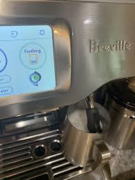 Fill the basket to level. The Barista Touch