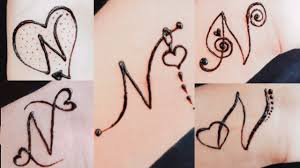 Inilah kumpulan nama perempuan islami berawalan huruf m sebagai ide inspirasi rangkaian nama bayi perempuan islam yang unik, indah, modern dan bermakna. Alphabet N Mehndi Tattoo Design 5 Easy And Beautiful Tattoos Of Letter N Diy Tattoo Youtube