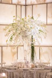 Hot this week in tall wedding vases in wedding centerpieces & table décor. Tall Flower Arrangements To Inspire Your Reception Centerpieces