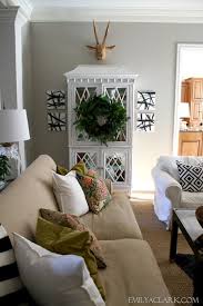 By using this site, you agree to our use of cookies and our terms. Our Christmas Home Tour Emily A Clark Family Room Decorating Living Room Wreath Christmas House Tour