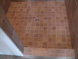 This Bathroom Remodel Features Mohawk S Sahara Stone Cairo Brown 10x13 Wall Tile 13x13 Floor Tile And 3 Shower Floor Tile Tile Floor Mosaic Shower Floor Tile