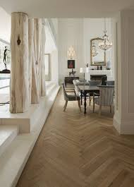 Love The Tree Trunks Mixed With Modern Furniture Designers Julian And Trevyn Mcgowan Applied Their Meticulous Eye Herringbone Wood Floor Home Herringbone Wood