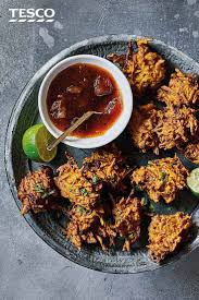 Squash Carrot And Onion Bhajis Indian Recipes Tesco Real Food Recipe Onion Bhaji Recipes Whole Food Recipes Recipes