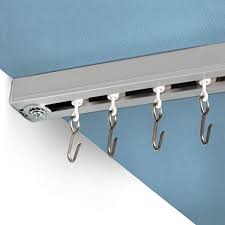 What kind of curtains do i look for (i.e., pinch pleat, rod pocket or other) to hang from the track? Amazon Com Room Dividers Now Ceiling Track Set X Large For Spaces 18ft 24ft Wide Silver Home Kitchen