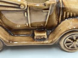 Image result for Pottery Brown 1931 Oldsmobile