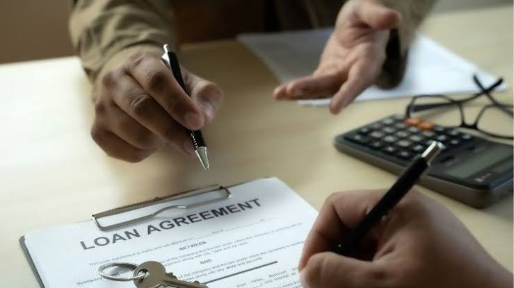 A person taking a loan from us