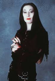 Morticia addams made it posible for creepy girls to be seen as freaking hot (my favorite rendition of morticia is the original version played by carolyn jones; Pin By Anne Cathrine Skaarup On Enchant Me Morticia Addams Gomez And Morticia Morticia Addams Costume