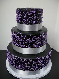 Check out this black, white and purple wedding cake and see more inspirational photos on theknot.com. Purple And Silver Wedding Cakes Purple Scrollwork Wedding Cake Black With Purple Wedding Cake Cake Halloween Wedding Cakes Cake Purple Cakes