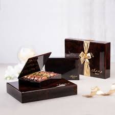 This corporate gift idea is made of premium, genuine leather and can be engraved with a company logo and the recipient's name. Luxury Gift Ideas Gourmet Date Gifts Bateel