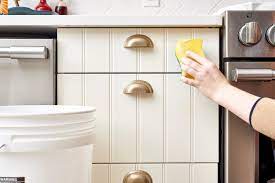 Soak your cloth in the solution and wring it out. How To Get Sticky Cooking Grease Off Cabinet Doors Kitchn