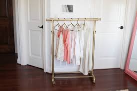 Making a diy clothing rack for your garage sale can be a quick and cheap solution. 20 Astoundingly Simple Diy Clothes Rack Tutorials Crafty Club Diy Craft Ideas