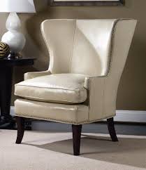 Create an inviting atmosphere with new living room chairs. Hamlin White Leather Wing Chair