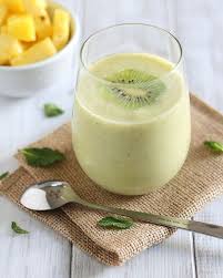 This Pineapple Kiwi Mint Smoothie Is Like A Taste Of The Tropics With Every Sip Food Mint Smoothie Yummy Green Smoothie