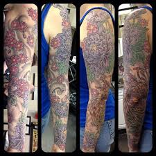 Floral Sleeve With Peonies Mums Cherry Blossoms By John Brehm At The Yellow Rose Tattoo Club Nc Yellow Rose Tattoos Tattoos Rose Tattoo