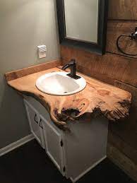 We used two slabs, planned and sanded them, then finished it off with a counter top resin. Bathroom Vanity Live Edge Live Edge Slab Live Edge Table Live Etsy In 2021 Reclaimed Wood Bathroom Vanity Rustic Bathroom Vanities Wood Bathroom Vanity