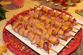 Serve seafood and offer tropical drinks and cocktails at the party. What You Make It Hawaiian Party Food Recipes Hawaiian Party Food Luau Party Food Party Food Menu