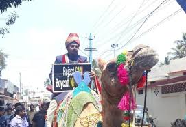 So when are you two going to tie the knot? Kerala Man Came For His Wedding On Camel Holding Anti Caa Poster