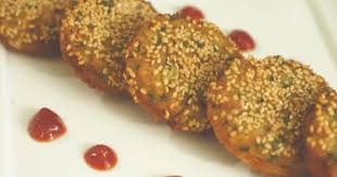 How To Make Sesame Gold Coin Recipe By Masterchef Sanjeev Kapoor Recipe Recipes Cooking Recipes Party Snack Food