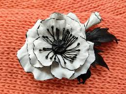 A unique white flower hair clip is coming to you make a flower cut out a strip of organza ribbon of about 14cm. Leather Flower Hair Clip Or Brooch Black White Unique Etsy Leather Flowers Flower Hair Clips Flowers In Hair