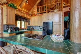 Faux painting techniques for the kitchen. Rustic Kitchen Cabinets In Log Homes Everything Log Homes