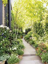 Bette Midler S Light Filled Manhattan Penthouse And Lush Garden Urban Garden Lush Garden Landscape Design